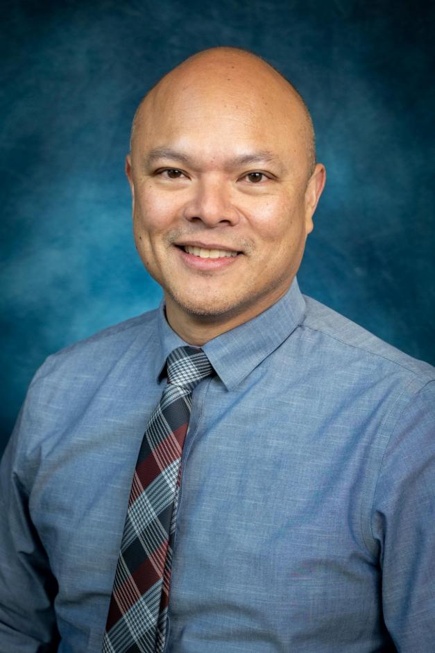 portrait of Michael Del Rosario